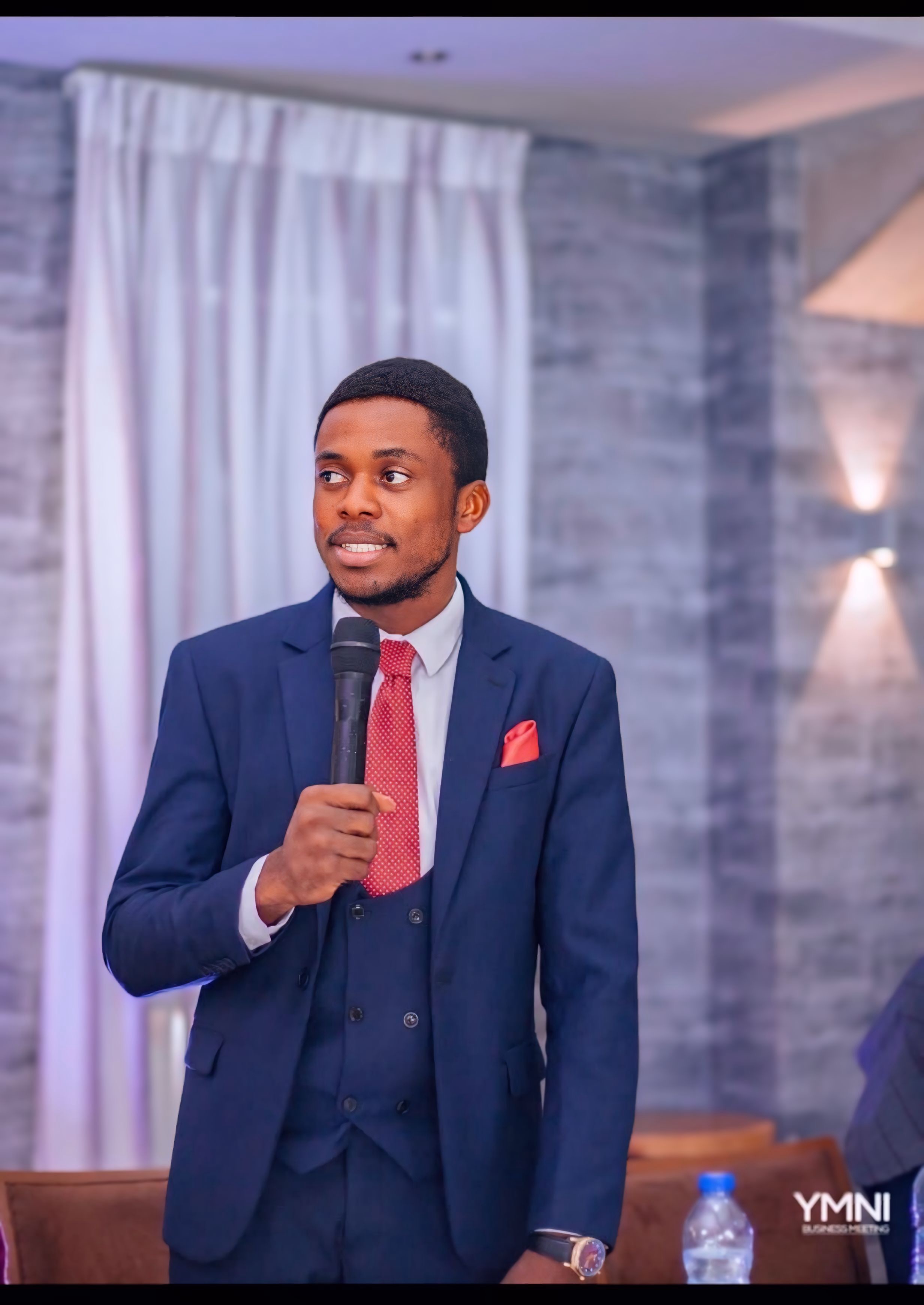 Pastor Samuel A. Ewool speaking at an event